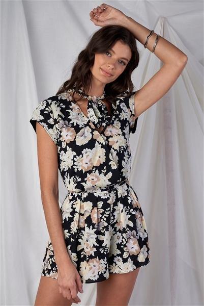 Black Multi Color Floral Print V-Neck Mini Sleeve Tight Fitted Waist Pleated Bottom Romper With Bow Tie Detail - Simpleaholic